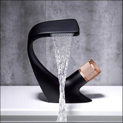 Black with a gold handle Bathroom Faucet with a Serene Waterfall Flow