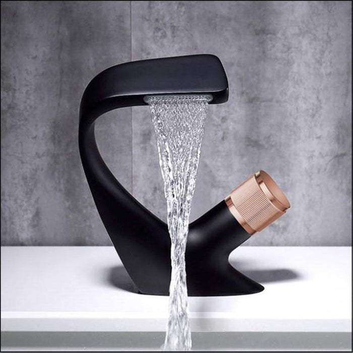 Black with a gold handle Bathroom Faucet with a Serene Waterfall Flow